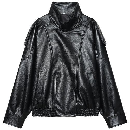 Front flat lay of the black oversized cropped moto jacket showing the asymmetric placket, epaulette straps and elasticated hem