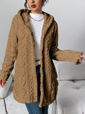 Front view of the open-front hooded cardigan in camel brown showing the oversized silhouette, long sleeves, attached hood and midi length